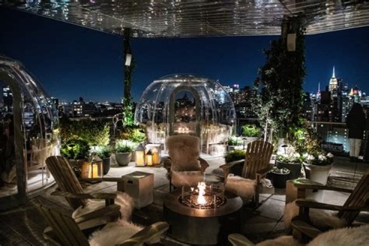 Heated rooftop igloos are providing the perfect adult winter warmer in one U.S. city