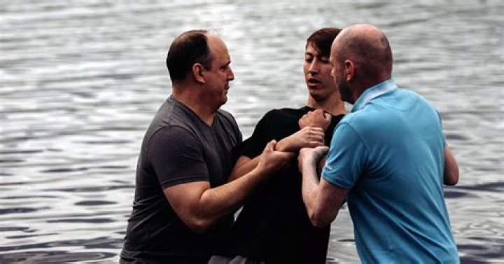 Hundreds of students baptized at Auburn University after moving worship service